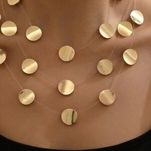Multi layer circle necklace 
So stylish, for all occasions